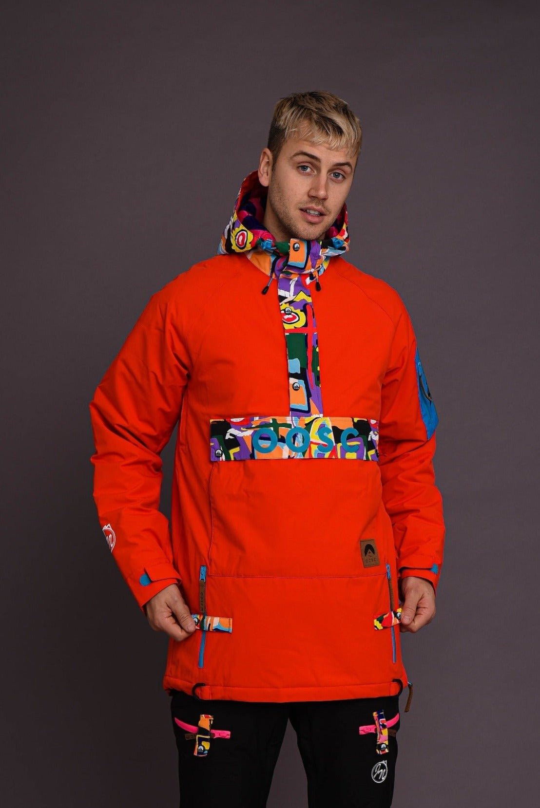 red overhead snowboard jacket